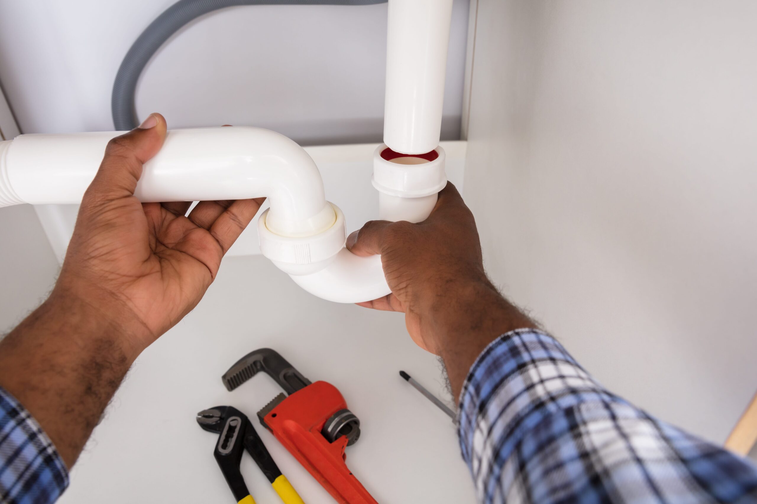 Should I Hire a Plumber to Change My Drain Trap?