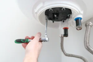 man installing hot water system in san antonio